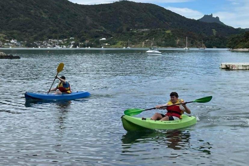 Two cadets kayaking at camp August, 2023.